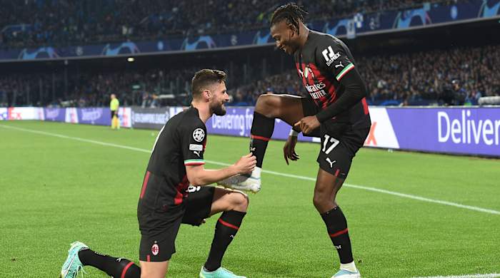 Rafael Leao and Olivier Giroud celebrate a goal.